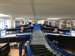 The Benefits of a Conveyor System for High-Volume Manufacturing and Distribution